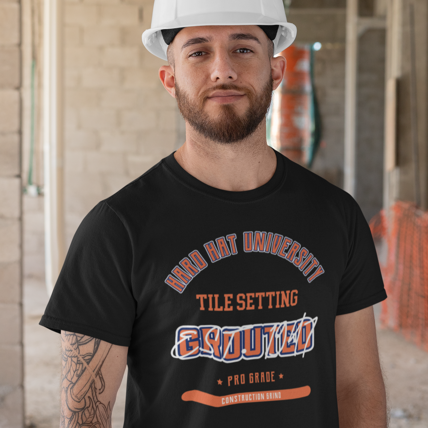 The Construction Grind “Hard Hat University” Tile Setter's Trade T-Shirt features 'Tile Setting – Grouted' in bold college sports style lettering, paying tribute to the skill & professionalism that builds our world. The “Established” date represents the year the trade was formally recognized in the U.S. The 'PRO-GRADE' stamp adds a touch of authenticity and pride. Design is featured on a black Gildan 5000 short-sleeved T-Shirt made with 100% U.S. cotton. Heavy Cotton 5.3 oz/y.