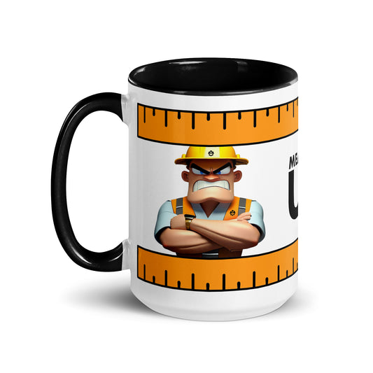 Left side of the "Measure Up" 15 oz. white ceramic mug by Construction Grind, with black accent interior and handle, featuring a stern looking Construction Foreman with his arms crossed and a safety orange colored measuring tape graphic, winding around the top and bottom of the mug.