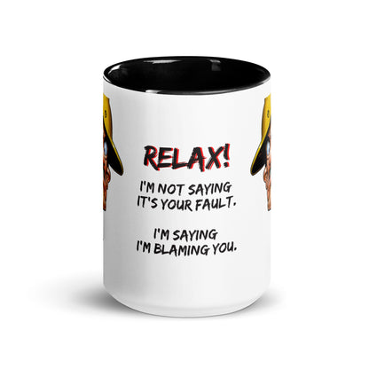 Front center of the "Relax! I'm Not Saying It's Your Fault. I'm Saying I'm Blaming You" 15 oz. white ceramic mug by Construction Grind, with black accent interior and handle. The front center of the mug features text exclaiming, "Relax! I'm Not Saying It's Your Fault. I'm Saying I'm Blaming You.".