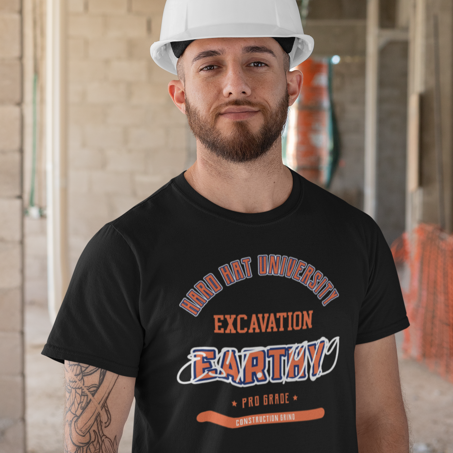 The Construction Grind “Hard Hat University” Excavator's Trade T-Shirt features 'Excavation – Earthy' in bold college sports style lettering, paying tribute to the skill & professionalism that builds our world. The “Established” date represents the year the trade was formally recognized in the U.S. The 'PRO-GRADE' stamp adds a touch of authenticity and pride. Design is featured on a black Gildan 5000 short-sleeved T-Shirt made with 100% U.S. cotton. Heavy Cotton 5.3 oz/y.