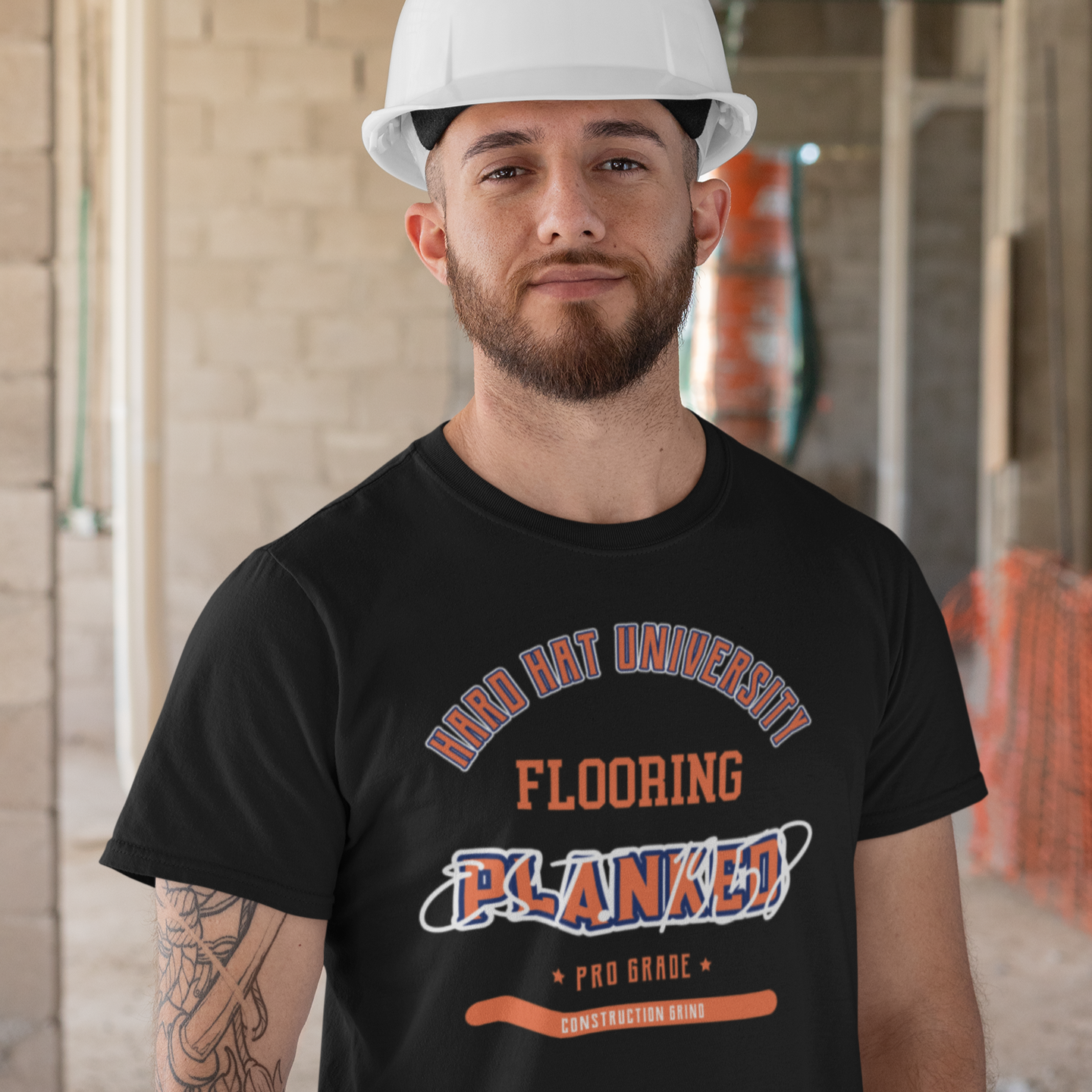 The Construction Grind “Hard Hat University” Flooring Trade T-Shirt features 'Flooring – Planked' in bold college sports style lettering, paying tribute to the skill & professionalism that builds our world. The “Established” date represents the year the trade was formally recognized in the U.S. The 'PRO-GRADE' stamp adds a touch of authenticity and pride. Design is featured on a black Gildan 5000 short-sleeved T-Shirt made with 100% U.S. cotton. Heavy Cotton 5.3 oz/y.