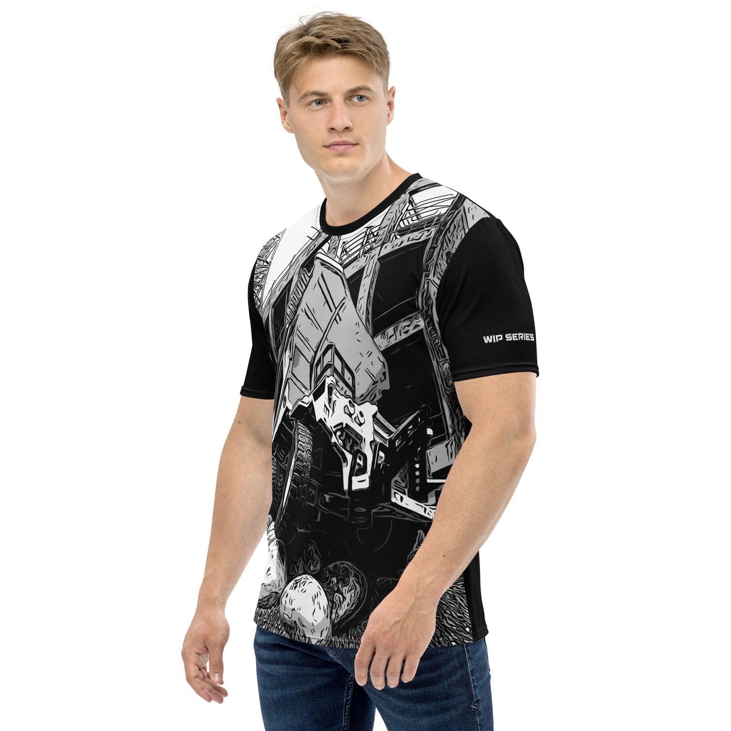 A man wearing our Construction Grind Big Dump all-over print short-sleeved t-shirt in black and white style, shown from the left-hand view. The image reveals the detailed main graphic of a dump truck in action on a construction site, and the left sleeve displays a white 'WIP SERIES' graphic. The design emphasizes bold construction imagery on a premium tee.