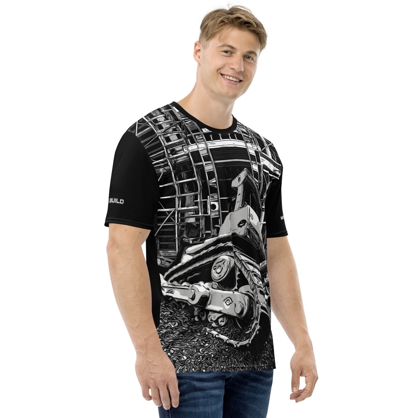 A man wearing our Construction Grind Dozer Duty all-over print short-sleeved t-shirt in black and white style, shown from the right-hand view. The image reveals the detailed main graphic of a bulldozer in action on a construction site, and the right sleeve displays a white 'I Build' graphic. The design emphasizes bold construction imagery on a premium tee.