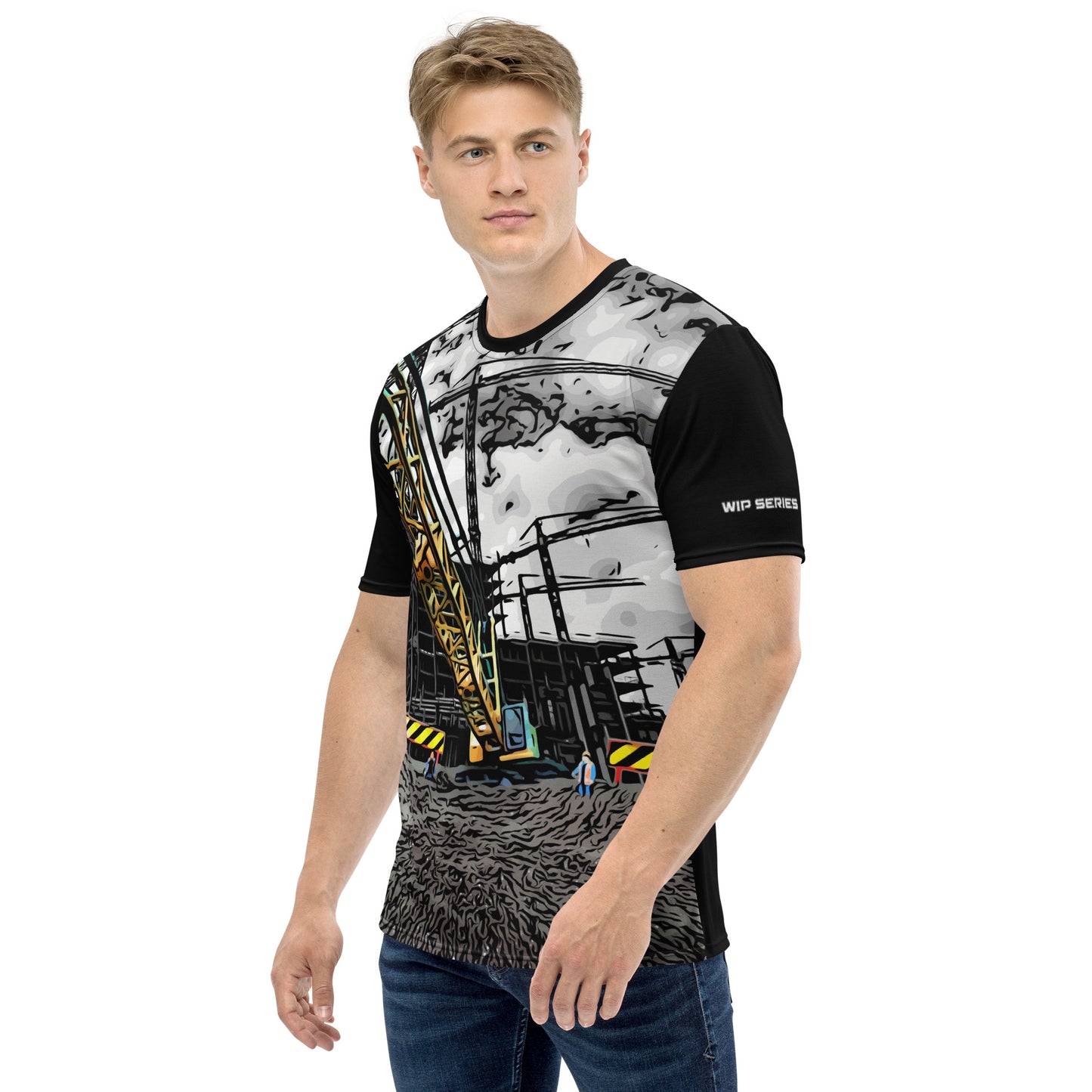 A man our wearing Construction Grind Heavy Lift all-over print short-sleeved t-shirt in cartooned style, shown from the left-hand view. The image reveals the detailed main graphic of a large crane in action on a construction site, and the left sleeve displays a white 'WIP SERIES' graphic. The design emphasizes bold construction imagery on a premium tee.