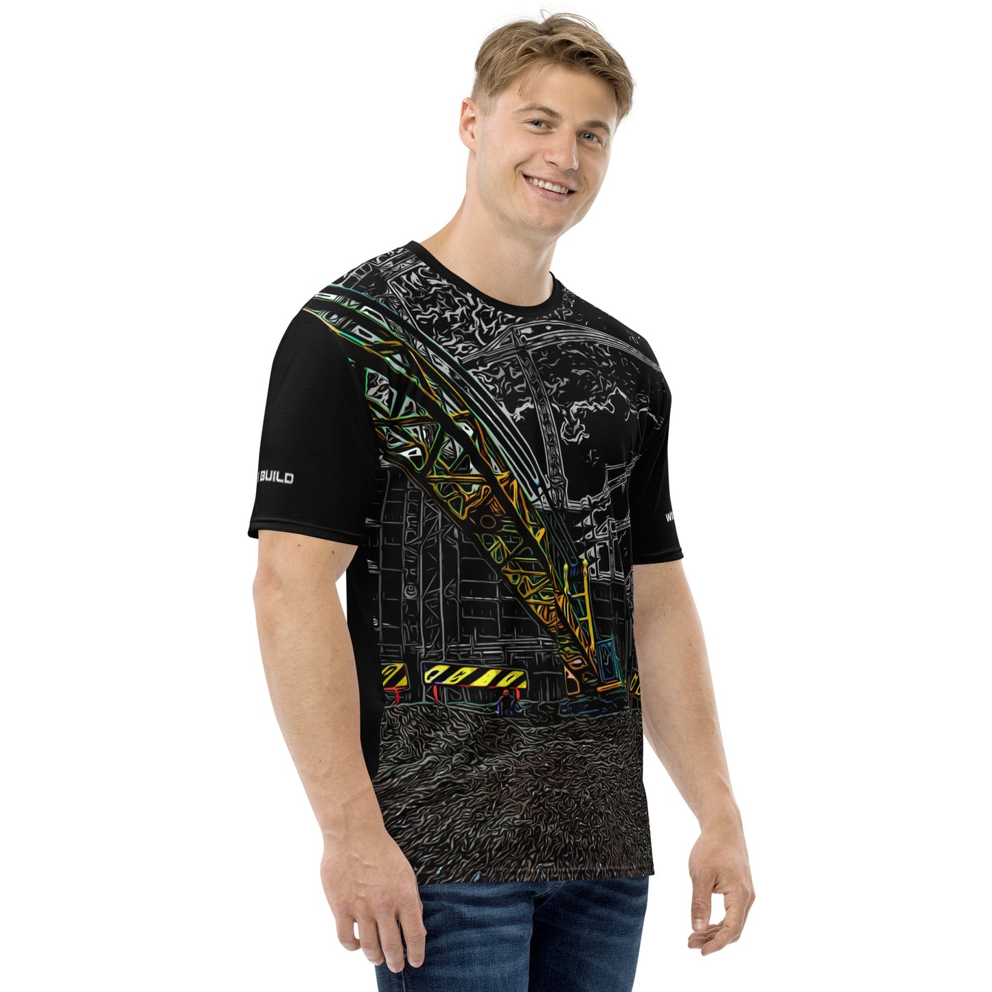 A man wearing our Construction Grind Heavy Lift all-over print short-sleeved t-shirt in night shift style, shown from the right-hand view. The image reveals the detailed main graphic of a large crane in action on a construction site, and the right sleeve displays a white 'I Build' graphic. The design emphasizes bold construction imagery on a premium tee.