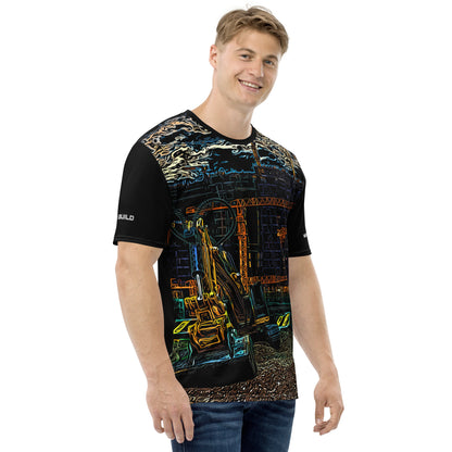 A man wearing our Construction Grind Trenching all-over print short-sleeved t-shirt in cartooned style, shown from the right-hand view. The image reveals the detailed main graphic of a backhoe in action on a construction site, and the right sleeve displays a white 'I Build' graphic. The design emphasizes bold construction imagery on a premium tee.