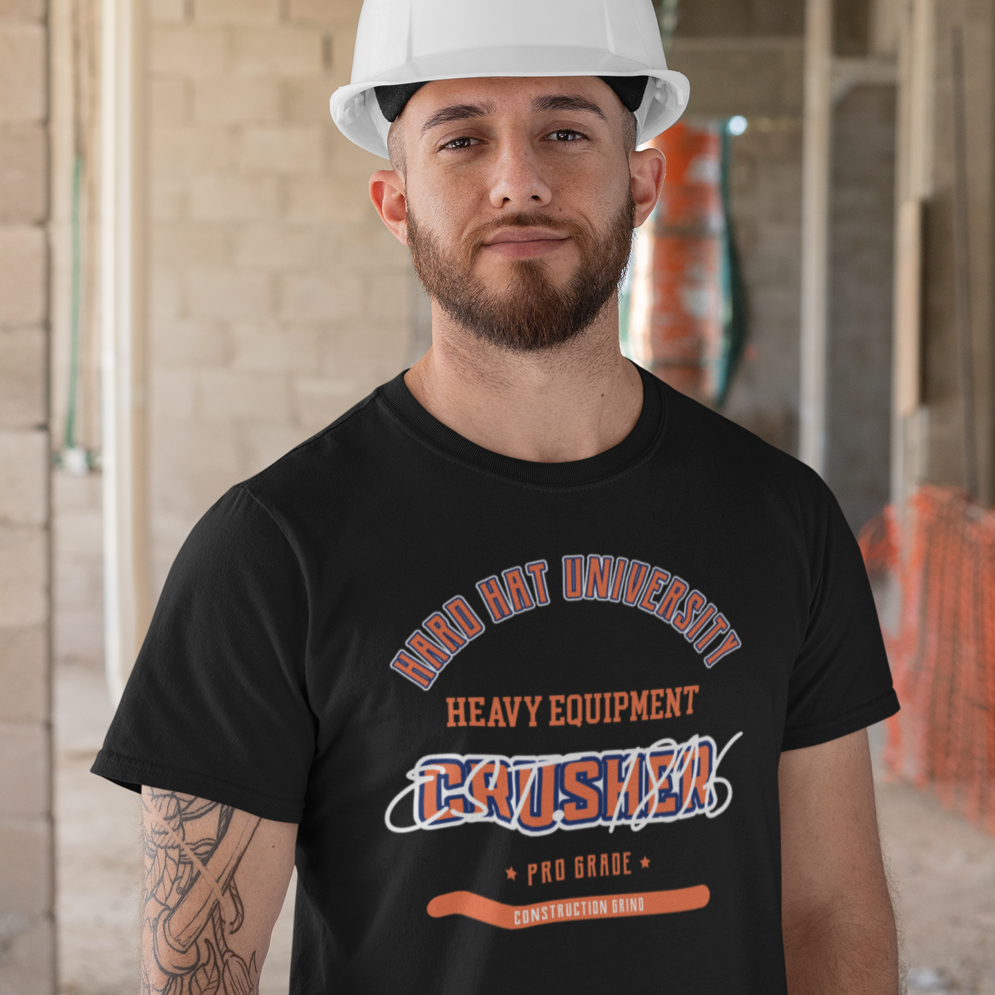 The Construction Grind “Hard Hat University” Heavy Equipment Operator's T-Shirt features 'Heavy Equipment – Crushed' in bold college sports style lettering, paying tribute to the skill & professionalism that builds our world. The “Established” date represents the year the trade was formally recognized in the U.S. The 'PRO-GRADE' stamp adds a touch of authenticity and pride. Design is featured on a black Gildan 5000 short-sleeved T-Shirt made with 100% U.S. cotton. Heavy Cotton 5.3 oz/y.