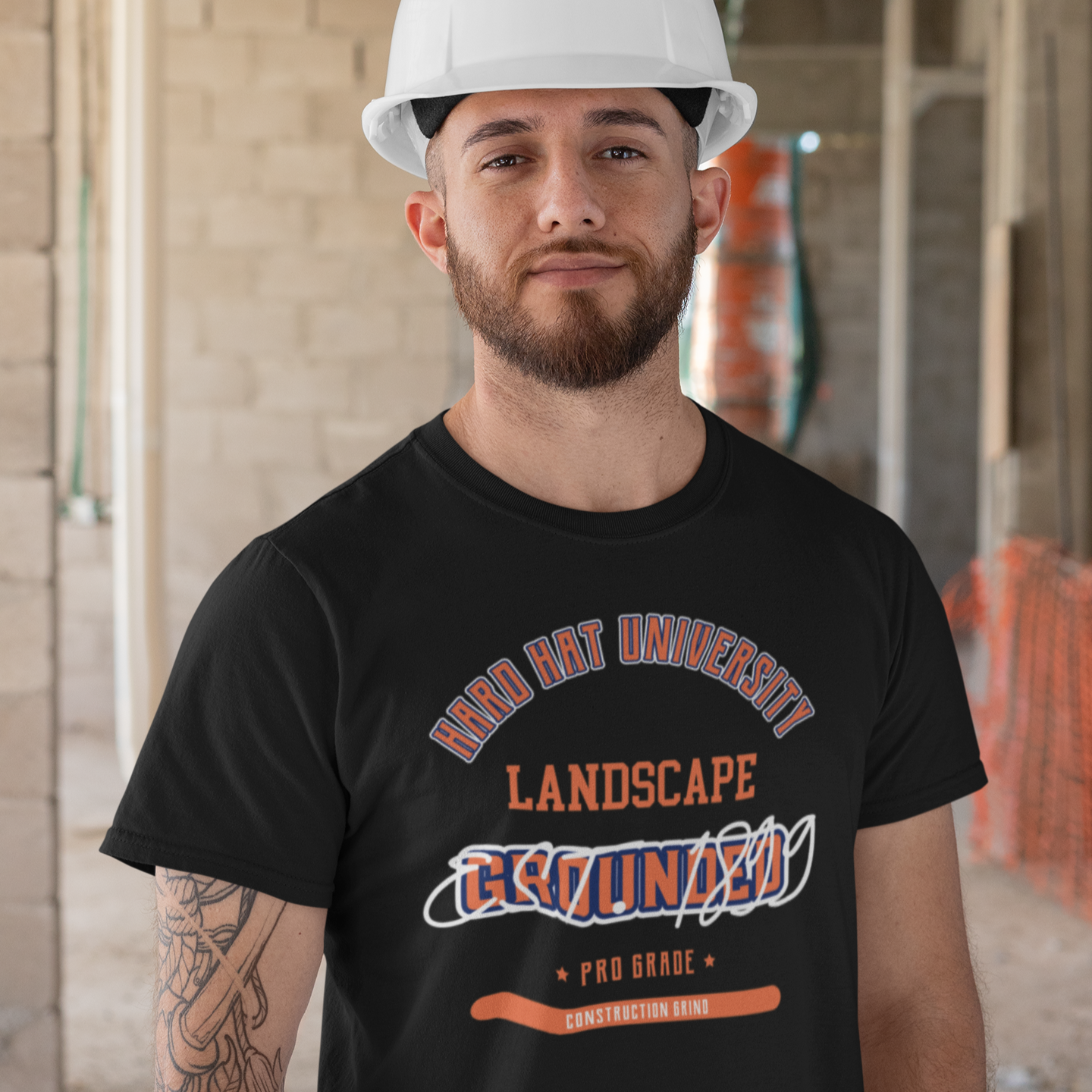 The Construction Grind “Hard Hat University” Landscaper's T-Shirt features 'Landscape – Grounded' in bold college sports style lettering, paying tribute to the skill & professionalism that builds our world. The “Established” date represents the year the trade was formally recognized in the U.S. The 'PRO-GRADE' stamp adds a touch of authenticity and pride. Design is featured on a black Gildan 5000 short-sleeved T-Shirt made with 100% U.S. cotton. Heavy Cotton 5.3 oz/y.