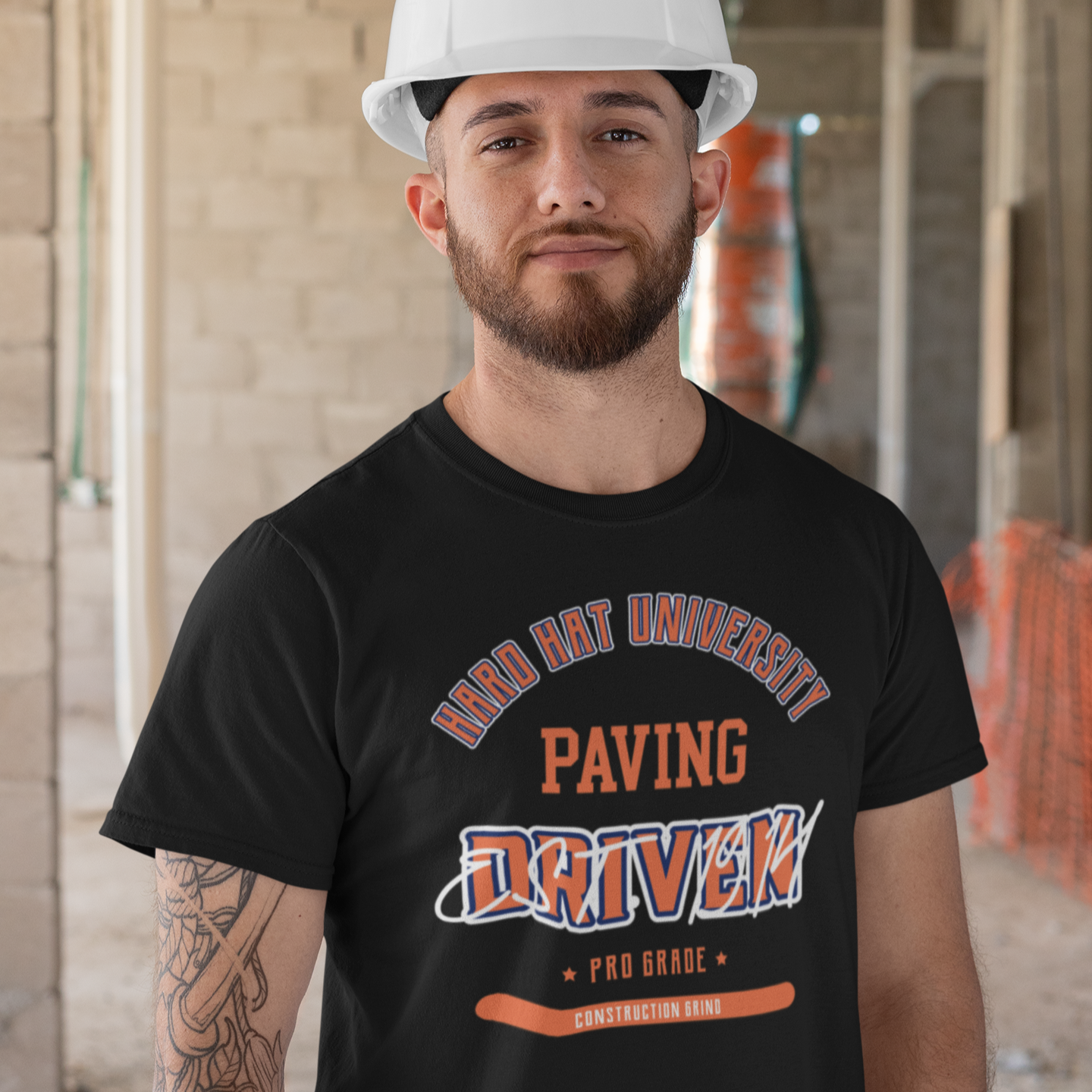 The Construction Grind “Hard Hat University” Paver's Trade T-Shirt features 'Paving – Driven' in bold college sports style lettering, paying tribute to the skill & professionalism that builds our world. The “Established” date represents the year the trade was formally recognized in the U.S. The 'PRO-GRADE' stamp adds a touch of authenticity and pride. Design is featured on a black Gildan 5000 short-sleeved T-Shirt made with 100% U.S. cotton. Heavy Cotton 5.3 oz/y.