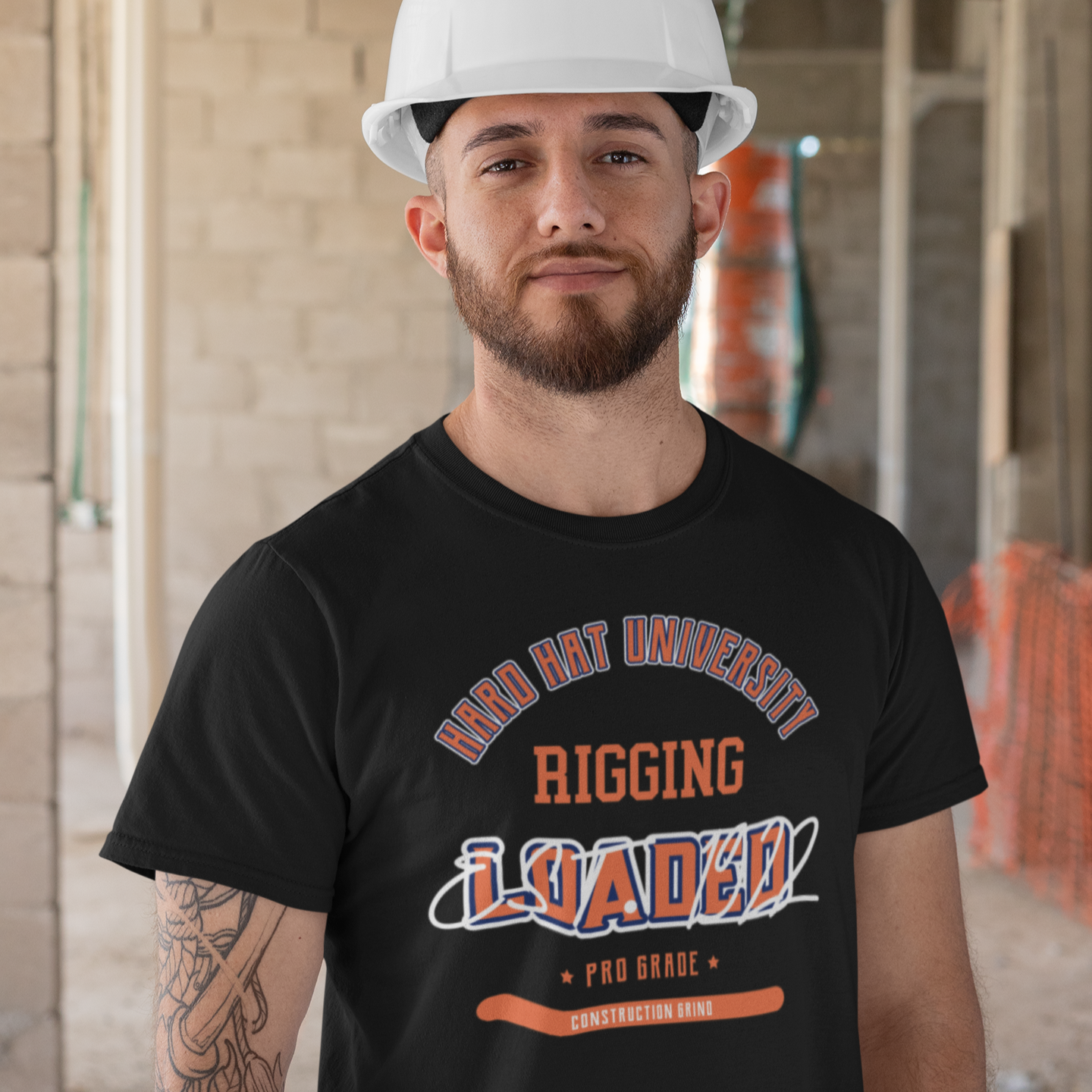 The Construction Grind “Hard Hat University” Rigger's Trade T-Shirt features 'Rigging – Loaded' in bold college sports style lettering, paying tribute to the skill & professionalism that builds our world. The “Established” date represents the year the trade was formally recognized in the U.S. The 'PRO-GRADE' stamp adds a touch of authenticity and pride. Design is featured on a black Gildan 5000 short-sleeved T-Shirt made with 100% U.S. cotton. Heavy Cotton 5.3 oz/y.