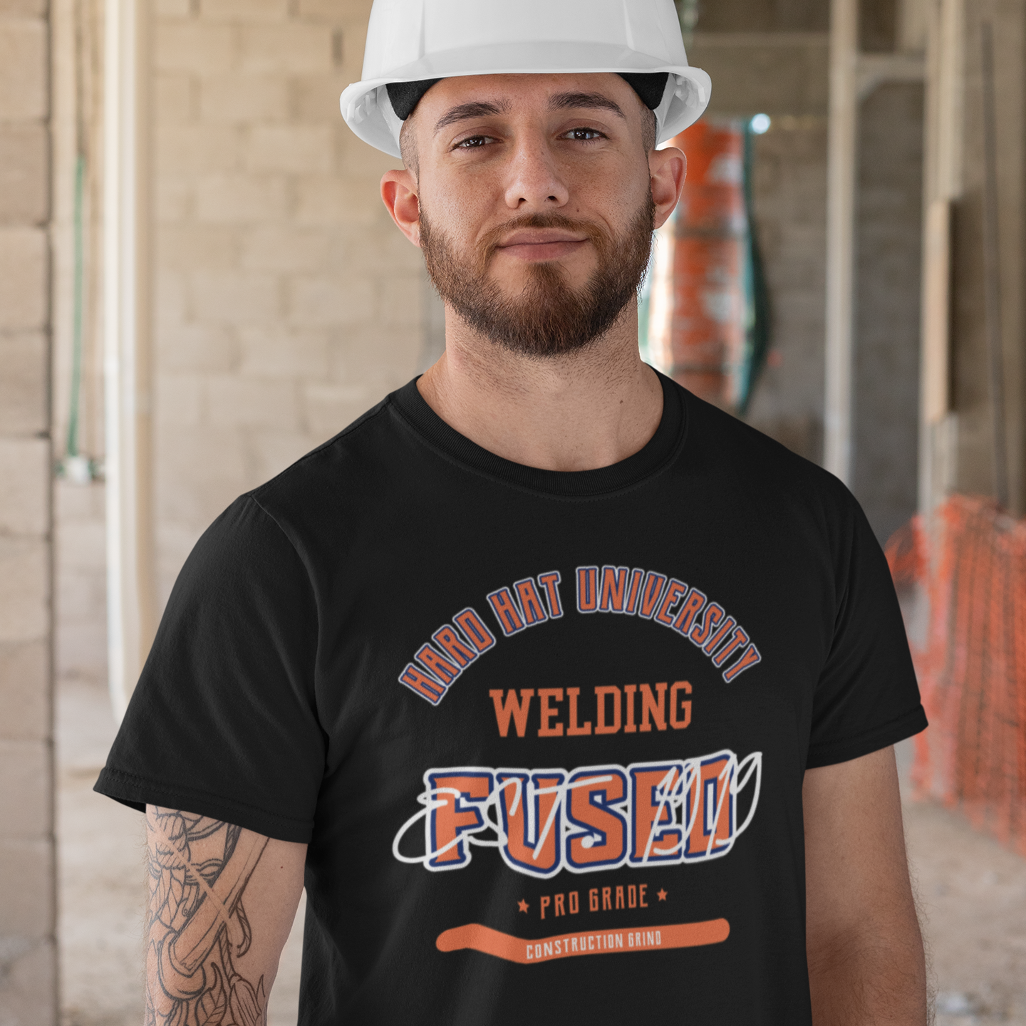 The Construction Grind “Hard Hat University”  Welder's Trade T-Shirt features 'Welding – Fused' in bold college sports style lettering, paying tribute to the skill & professionalism that builds our world. The “Established” date represents the year the trade was formally recognized in the U.S. The 'PRO-GRADE' stamp adds a touch of authenticity and pride. Design is featured on a black Gildan 5000 short-sleeved T-Shirt made with 100% U.S. cotton. Heavy Cotton 5.3 oz/y.